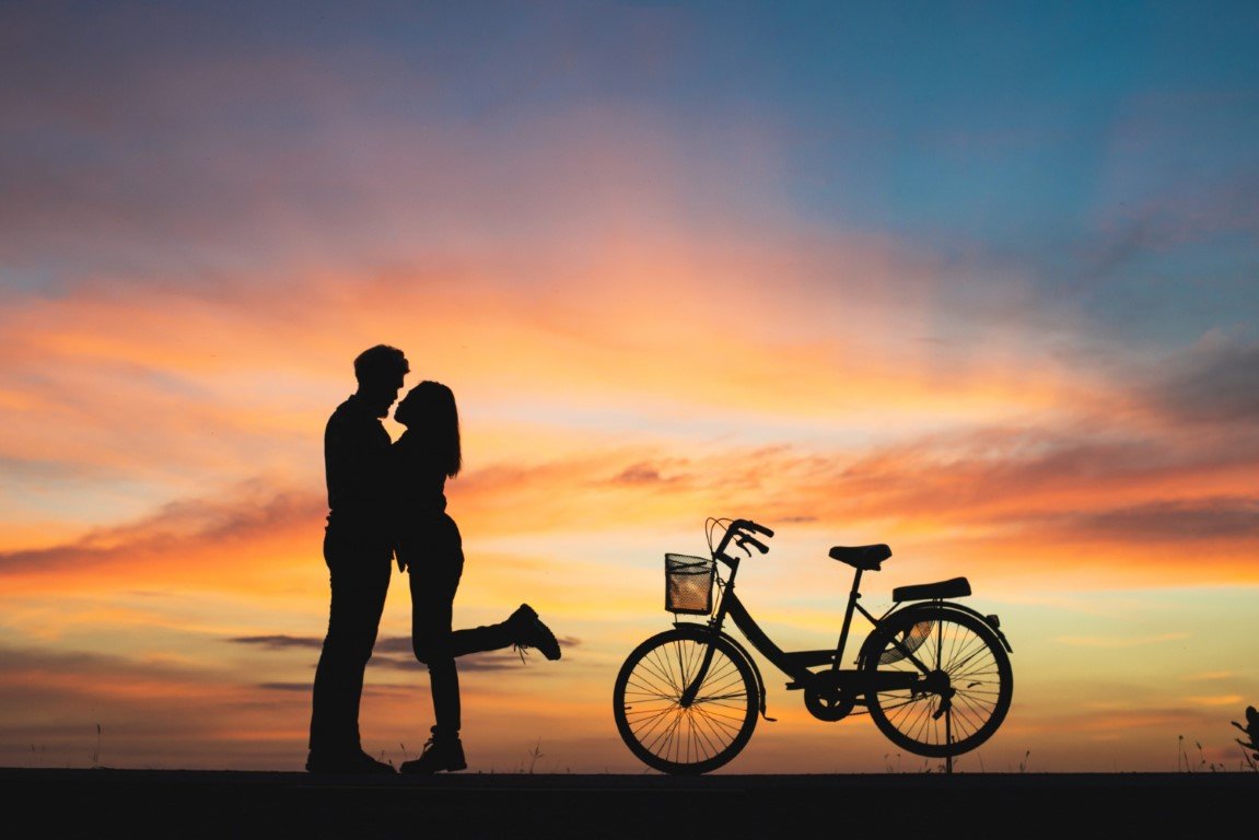 silhouette couple love kissing sunset couple love concept